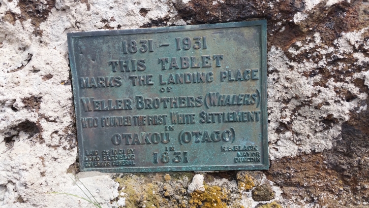 The plaque on Weller's Rock